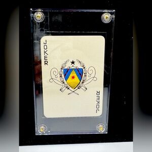 Louis Vuitton Joker Playing Card (1975) in safety display case.